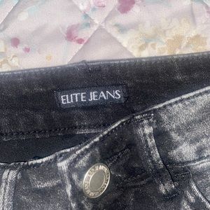 Black acid washed distressed jeans